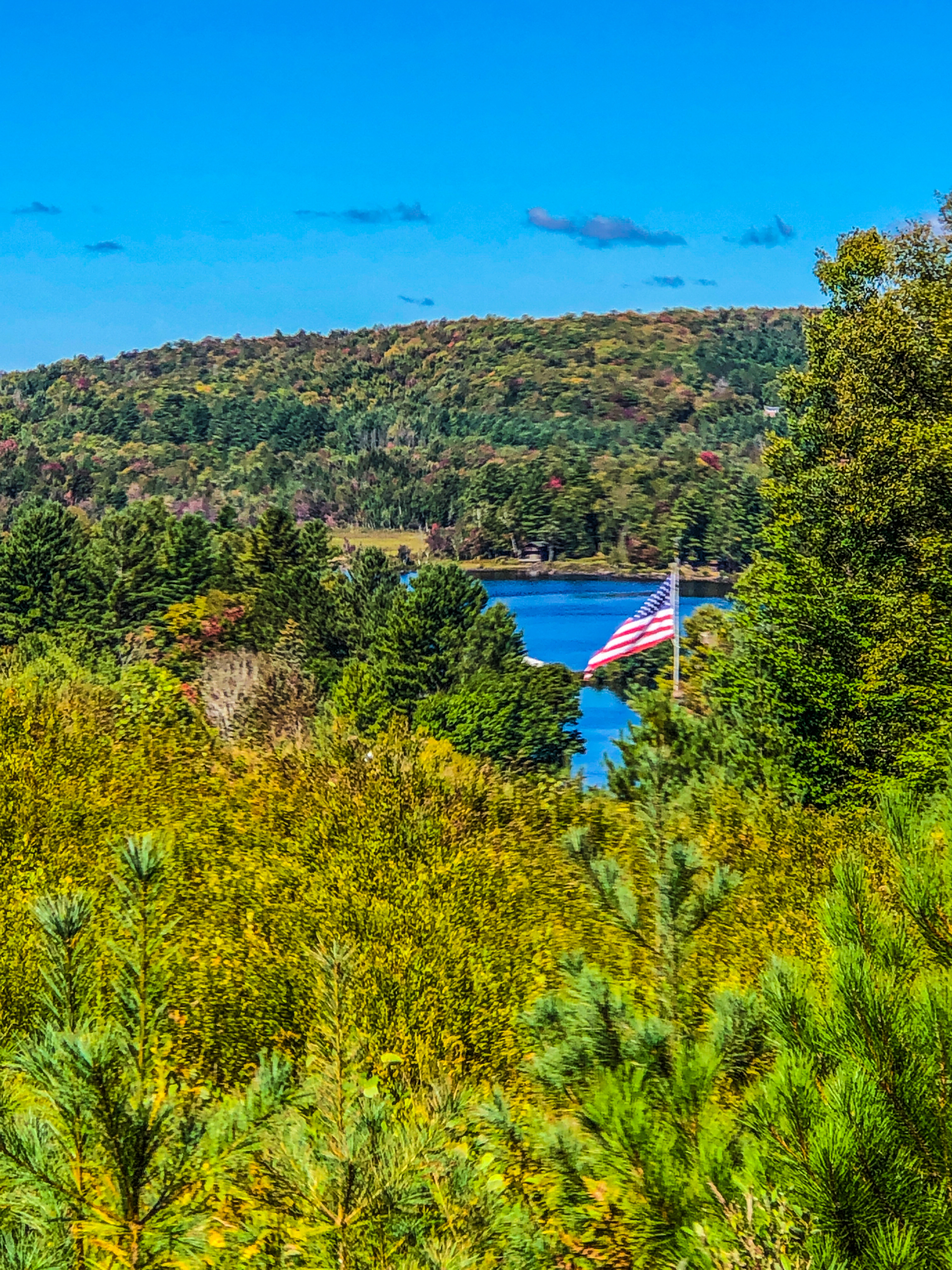 view from mountain and flag pole